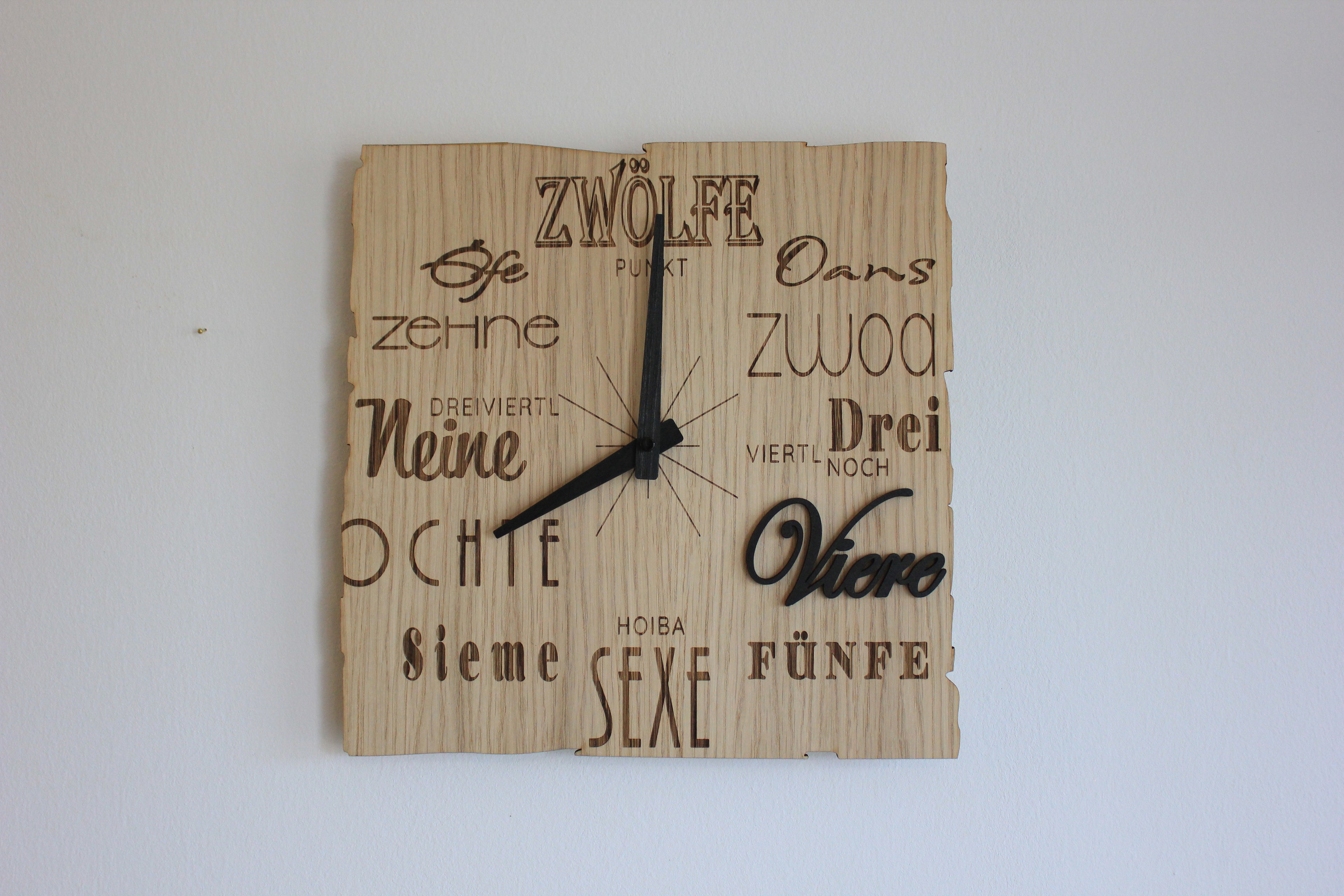Wanduhr Mundart
